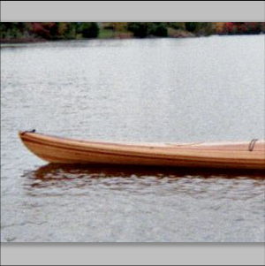 Cedar strip kayak on lake